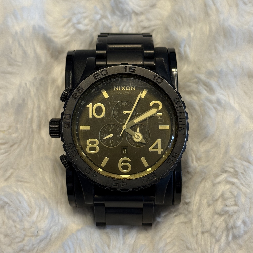 Nixon Black and Gold Chronograph Watch